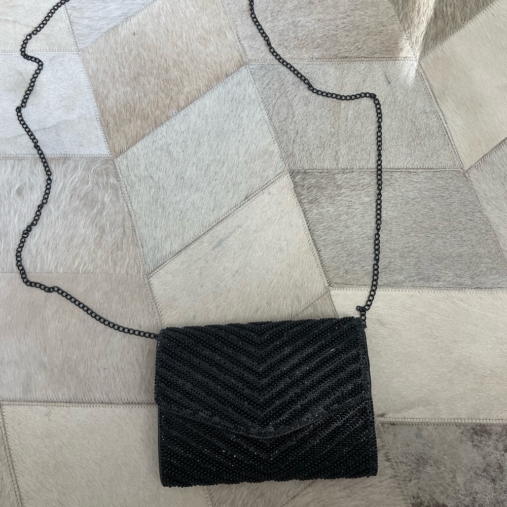Denadda black sparkle crossbody mini bag. Removable strap.